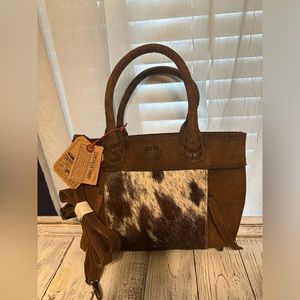 STS Ranchwear leather and cowhide conceal carry purse. Crossbody strap included